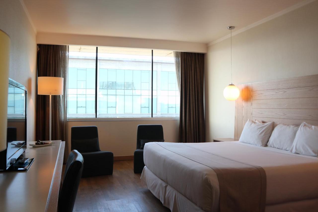 Wyndham Concepcion Pettra Hotel Luaran gambar A room at the hotel