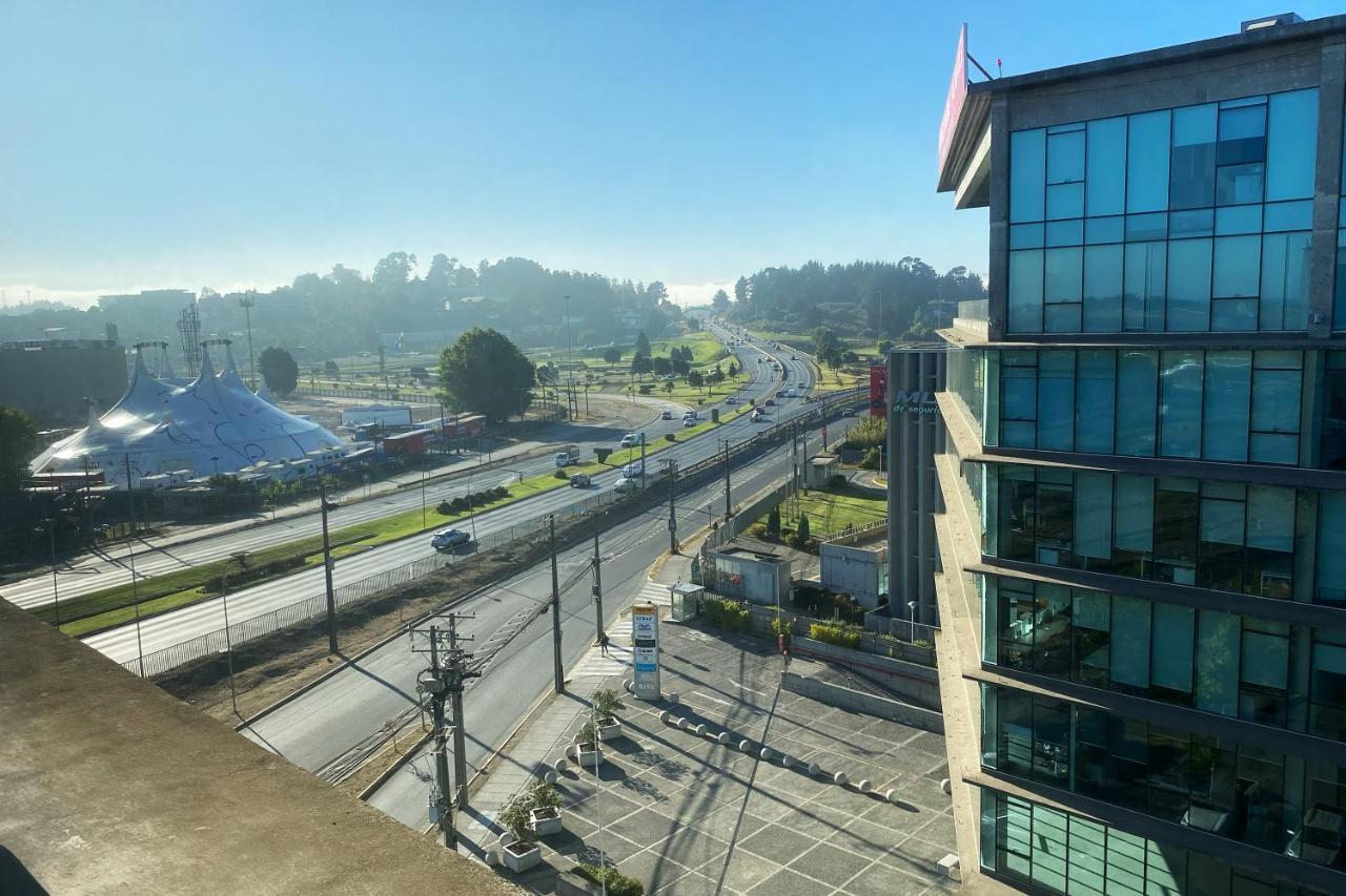 Wyndham Concepcion Pettra Hotel Luaran gambar View of the station from the hotel